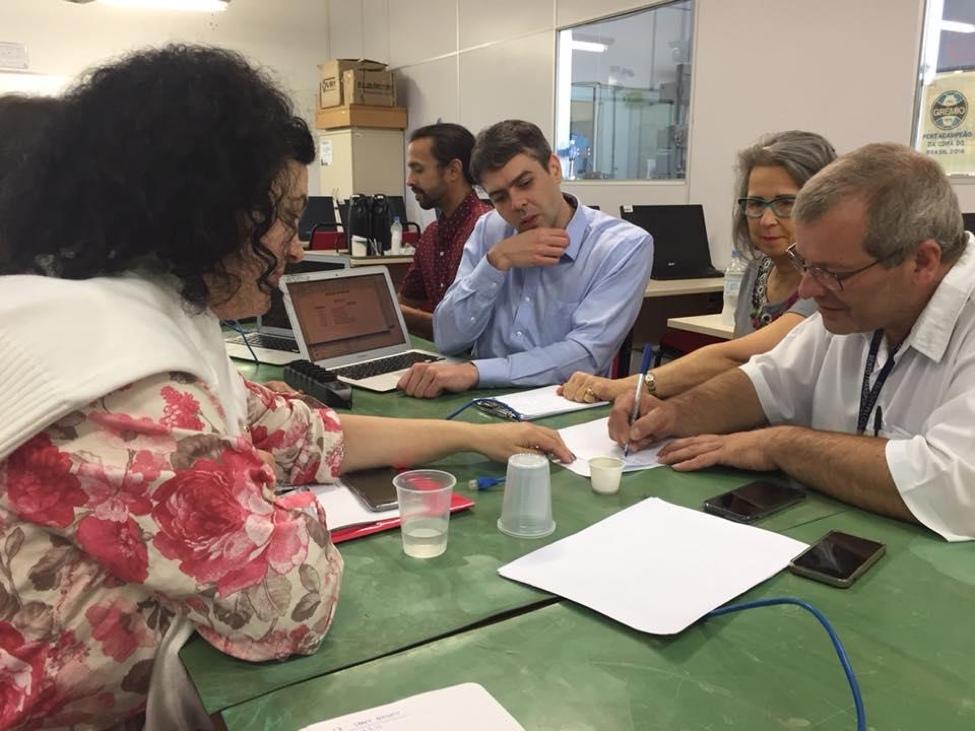 Picture of the ByBus team strategizing at a meeting